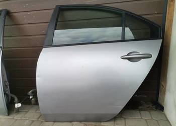 NISSAN PRIMERA P12 HB DRZWI LEWY TYŁ KY0G