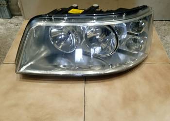 VW T5/ multivan/H7/H7l reflektor lewy orginal