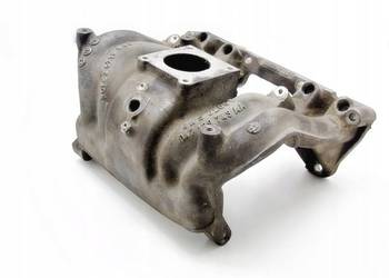 KOLEKTOR SSĄCY 047129743AA 1.4 8V MPI SKODA FABIA