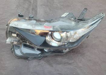 TOYOTA AURIS II LIFT  REFLEKTOR LEWY LAMPA PRZÓD LEWA 81150-02K30 / 295
