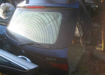 bmw x1 e84  09-12r klapa pokrywa bagażnika lampy  tiefseeblau a76