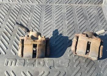 Zacisk hamulcowy przód przedni prawy lewy Clio II lift