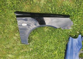 Błotnik przedni prawy czarny Hyundai Accent II lift 02-06
