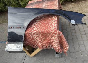 Prawy błotnik BMW e38 przed lift