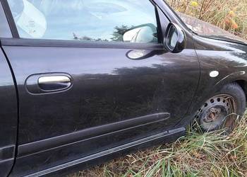 Drzwi prawe prawy przód Nissan Almera n16  kolor Z11