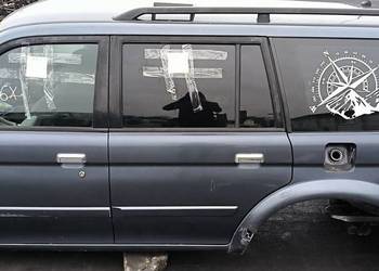 DRZWI LEWE TYŁ MITSHUBISHI MONTERO