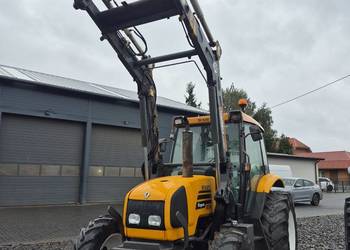 Renault Ergos z pozadnym  ladowaczem faucheuxa same zetor ursus case deutz