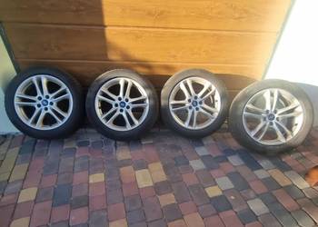 Oryginalne alufelgi Ford 17 cal z oponam zimowymii premium Continental