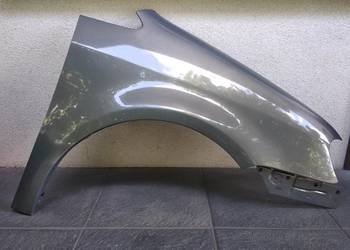 VW Touran 1T0 Caddy błotnik przedni lewy kierowcy 1T08242166 LA7X oryginał
