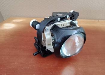 Soczewka skrętna lampy reflektora VW PASSAT B7 2011