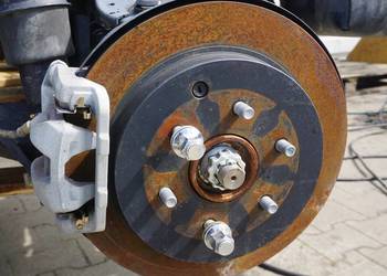 ZACISK HAMULCOWY TYŁ PRAWY LUB LEWY INFINITI QX80