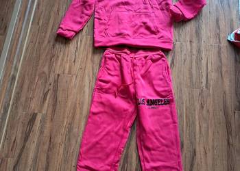 nowy różowy damski dres rozmiar z metki L ale to raczej M brak metki