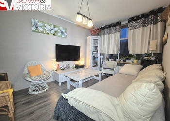 Mieszkanie z garderobą, ogródkiem i garażem.