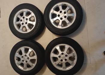 KOŁA, felgi z oponami całorocznymi NOKIAN 195/65R15 Opel Zafira 5x110