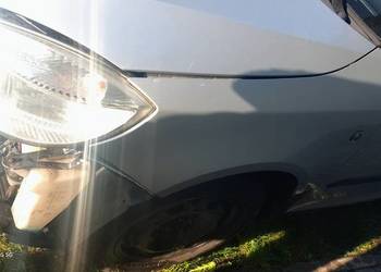 Błotnik lewy strona kierowcy Skoda Fabia 2 roomster