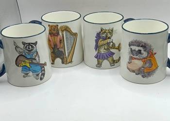 Cztery muzyczne kubki ze zwierzętami Cztery muzyczne kubki ze zwierzętami