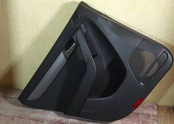 Boczek tapicerka drzwi VW Passat B7 kombi Lewy tył + głośnik (4szt.)