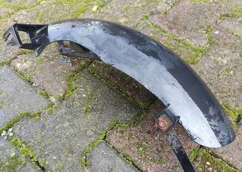 Błotnik wewnętrzny nad koło do skutera chińskiego Bassa Zipp Romet Keeway i