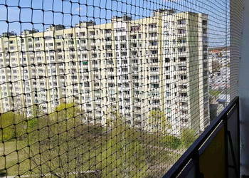 Montowanie siatek przed gołębiami Warszawa Siatka na Balkon z montażem