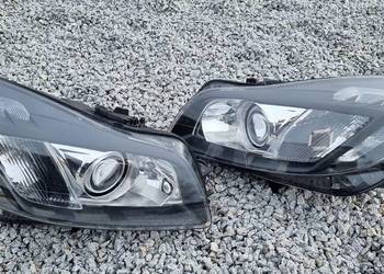 Lampy bi xenon Opel Insignia A skrętne regenerowane reflekto