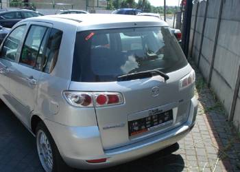 mazda 2 lift DY lampa lewa tylna w błotnik