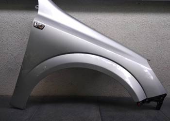 Opel Astra H błotnik przedni prawy srebrny Z157