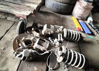 AUDI 80 B4 80B4 mcpherson PRAWY LEWY AMORTYZATOR PIASTA ZACISK HAMULCOWY