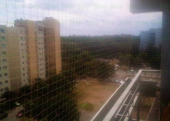 Montaż siatki na balkon BEZINWAZYJNY MONTAŻ Warszawa Kocia Siatka Montaż