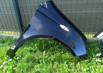Błotnik prawy lewy Toyota Yaris P1 99-05 kod lakieru 209 lakier oryginał