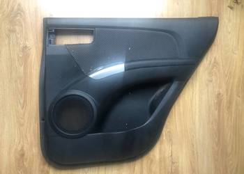 KIA SPORTAGE II 2 BOCZEK TAPICERKA OBICIE DRZWI PRAWY TYŁ