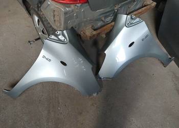 Błotnik Przedni Prawy  1F8 Toyota Yaris II Wysyłka