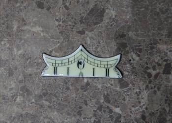 45 Wychylnik wahadła starego zegara tzw porcelanka seledynka