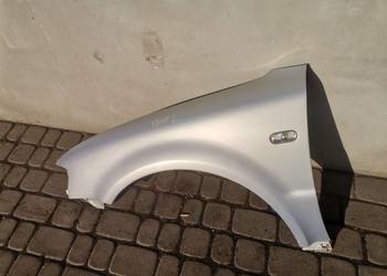 BŁOTNIK LEWY PRZÓD VW PASSAT B5 LB7Z