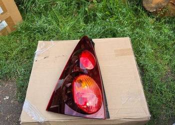Lampa lewa lewy tył tylna Peugeot 107 1607990580