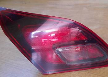 Lampa lewa tylna w klapie dymiona Opel Astra J