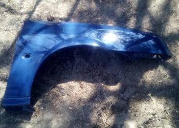 Błotnik przedni prawy FORD FIESTA 99-02. LIFT niebieski. Błotnik przedni prawy FORD FIESTA 99-02. LIFT niebieski.