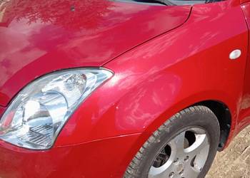 Błotnik Suzuki Swift 2005-2010 czerwony zdf