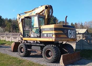 Cat 315 umowa koparka kołowa