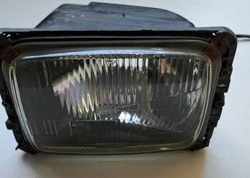 Reflektor lewy Mercedes T1 kaczka 207 307