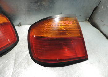 NISSAN PRIMERA P11 HB LAMPA LEWY TYŁ