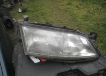 Lampa przednia prawa reflektor ori carello Opel Vectra B 96-99