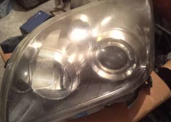Reflektor lewy avensis 2008 lift