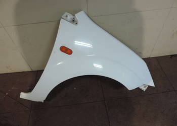 BŁOTNIK PRAWY PRZEDNI FORD FIESTA MK 6 FL KOLOR H7