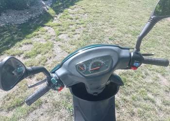 Skuter  Kinroad z kaskiem