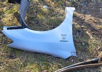 Błotnik Lewy lub Prawy Toyota  Corolla E 12 Przed FL srebrny lub Granatowy Błotnik Lewy lub Prawy Toyota  Corolla E 12 Przed FL srebrny lub Granatowy