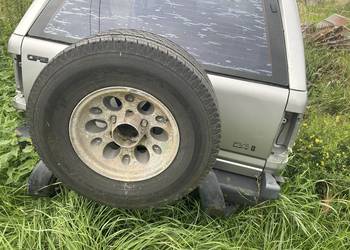 Wieszak koła zapasowego Opel frontera a long
