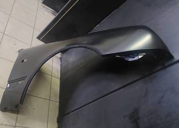 Błotnik przedni prawy nowy Mercedes w210 przedlift