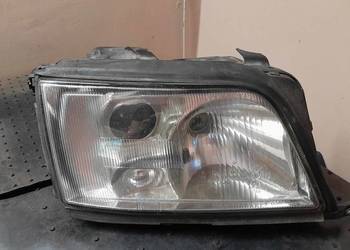 Reflektor lampa przednia prawa A6 C4 HELLA SOCZEWKA