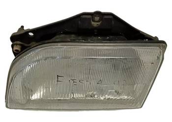 Reflektor lampa przednia prawy Ford Fiesta Mk3 90FG13006A2A oryginalny