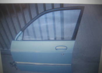 daihatsu sirion 02-05r drzwi przód lewe kod lakieru b52 b 52 niebieskie daihatsu sirion 02-05r drzwi przód lewe kod lakieru b52 b 52 niebieskie
